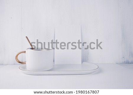 A cup of coffee l on white paper background.