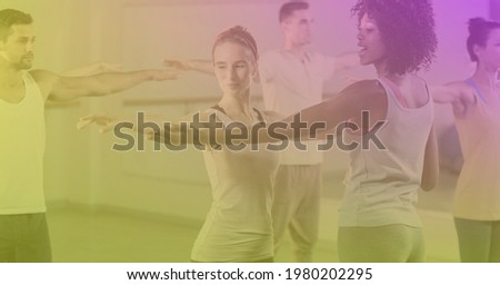 Composition of men and women exercise class on purple tinted background. exercise, wellbeing and active lifestyle concept digitally generated image.