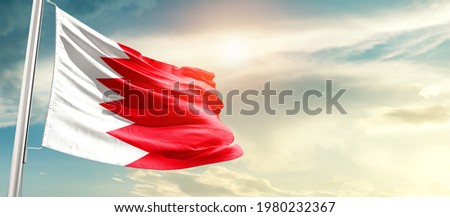 Bahrain national flag waving in beautiful sunlight. Royalty-Free Stock Photo #1980232367