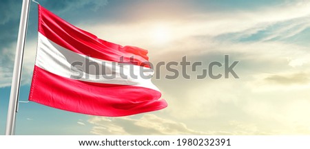 Austria national flag waving in beautiful sunlight.
