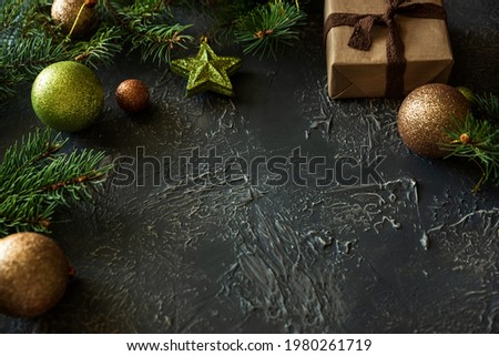Christmas background with decorations and gift boxes on concrete table.  Copy space.  Merry christmas and happy new year celebration concept. Mock-up