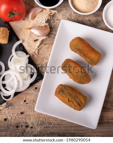 squid croquettes in their ink