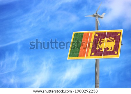 Solar panels against a blue sky with a picture of the flag of Sri Lanka