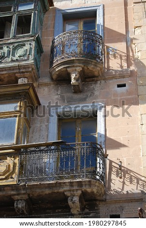 Malta, facade of a historic building with balconies