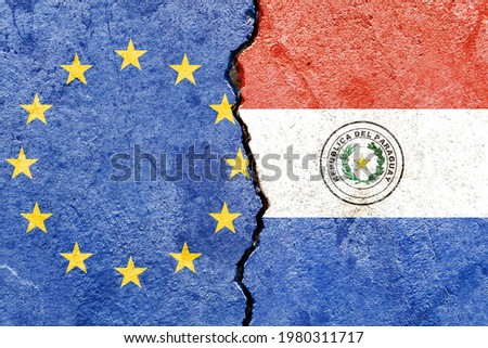 Grunge EU vs Paraguay national flags pattern isolated on broken cracked wall background, abstract Europe Paraguay politics relationship friendship divided conflicts concept texture wallpaper