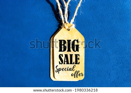 Inscription big sale. Inscription big sale on blank tag on blue background
