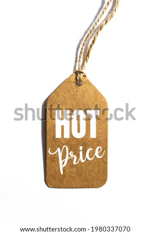 Financial concept meaning Hot Price with inscription on the sheet. Inscription hot price on blank tag on white background