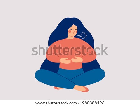 Woman makes Breathing exercise. Girl sits on the floor in pose lotus and makes a exhale. Recovery Respiratory system after illness. Health and wellbeing concept.  Royalty-Free Stock Photo #1980388196