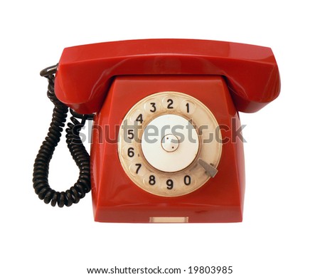Vintage red phone on white background