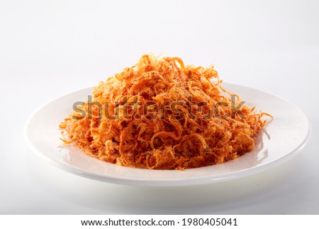 Delicious fresh meat floss on a white background Royalty-Free Stock Photo #1980405041