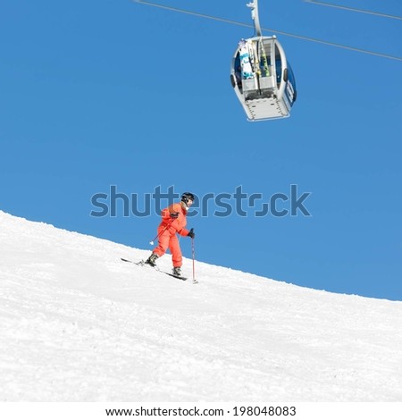 The young woman on a mountain-skiing slope of the resort of Mayrhofen - Austria