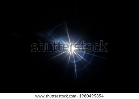 Easy to add lens flare effects for overlay designs or screen blending mode to make high-quality images. Abstract sun burst, digital flare, iridescent glare over black background. Royalty-Free Stock Photo #1980495854