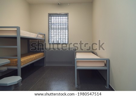 A typical modern prison or detention facility. Illustrative universal background for crime and incident news. Royalty-Free Stock Photo #1980547514