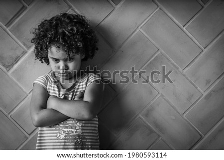 Crop close up portrait of serious sad little Caucasian girl, unhappy small child kid orphan feel lonely abandoned, outcast or loner miss parents, children drama, volunteer concept Royalty-Free Stock Photo #1980593114