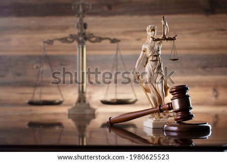 Judge's gavel. Wooden background. Place for typography.