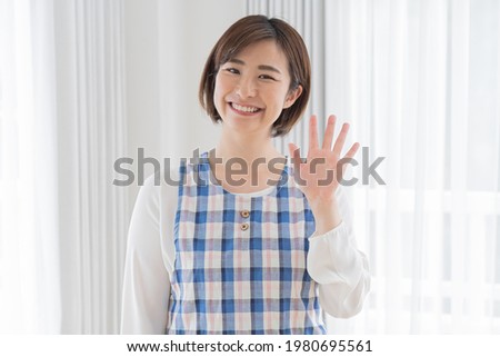 Japanese woman wearing an apron