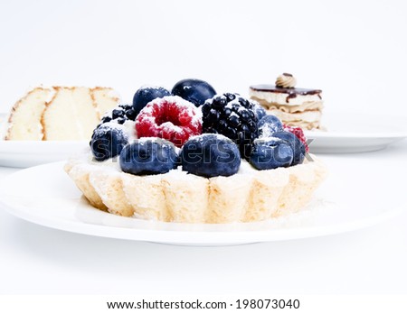Studio shot of mixed berry mini tart
