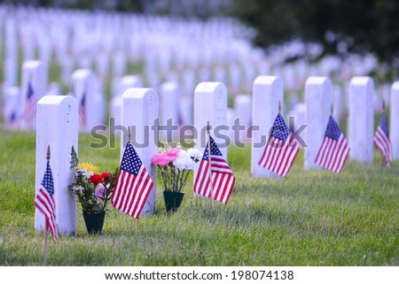 Arlington National Cemetery with a flag next to each headstone during Memorial day - Washington DC United States  Royalty-Free Stock Photo #198074138