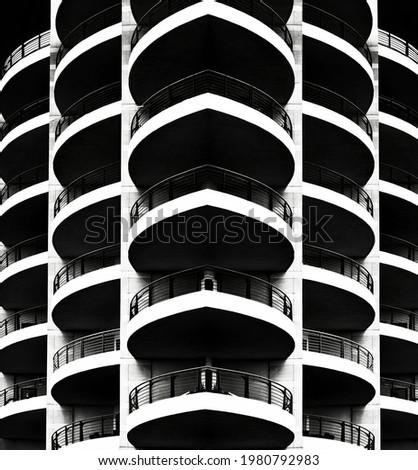 Abstract photo of architectural building, cropped, black and white. Creative photo of block building Royalty-Free Stock Photo #1980792983