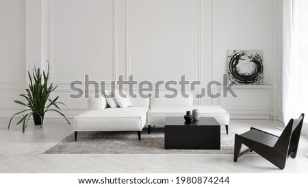 Modern white designer sofa on legs with cushions on grey carpet in middle of minimalistic living room with high ceiling, futuristic chair, green plant, abstract picture and two vases on table Royalty-Free Stock Photo #1980874244