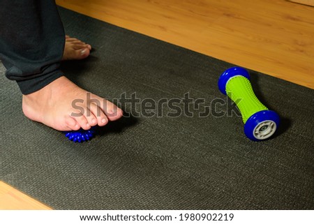 Man doing rehabilitation. Man doing rehabilitation on his foot after suffering a fracture. Man doing rehabilitation exercises at home.
