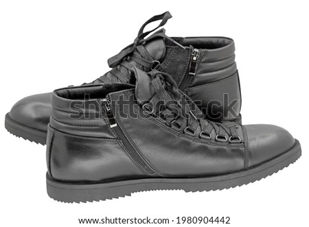 new black winter boots on a white background 