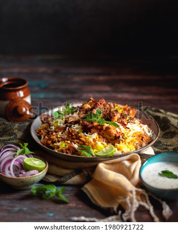 Hyderabadi Chicken Biryani Food Photos Royalty-Free Stock Photo #1980921722