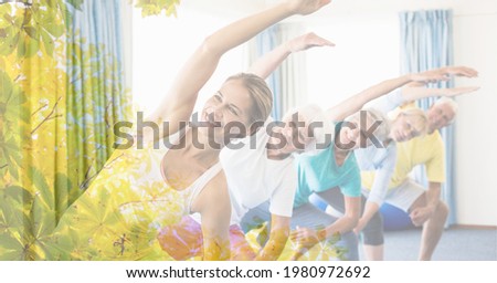 Composition of female instructor with senior man and women exercising with tree overlay. retirement, fitness and active lifestyle concept digitally generated image.