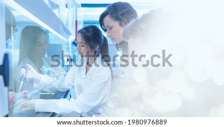 Composition of female lab technicians at work, with white bokeh copy space to right. medical and science research concept digitally generated image.