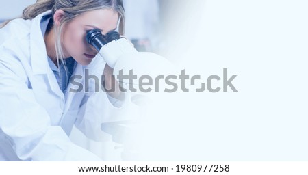 Composition of female lab technician using microscope, with white blurred copy space to right. medical and science research concept digitally generated image.