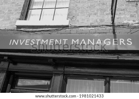 Traditional Investment Manager sign on high street