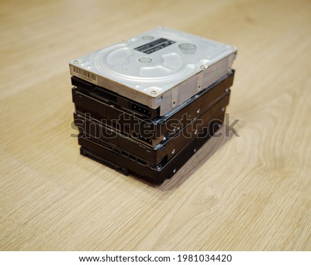 Hard Disk Drives old and new models in pile