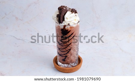 Cookie milkshake glass isolated on white