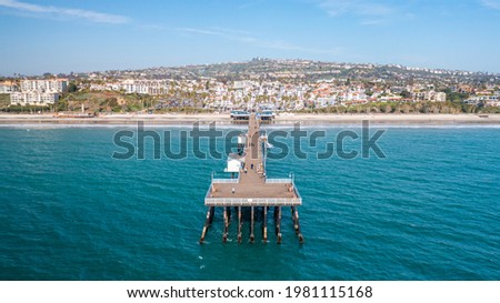 Aerial View of San Clemente, California, Looking Down the Pier and Downtown from the Ocean Royalty-Free Stock Photo #1981115168