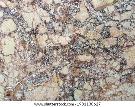 The background is natural brown stone marble. Marble pattern natural background. Natural Veined stone