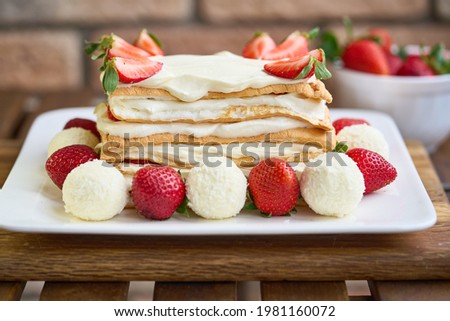 Homemade meringue Keto cake with strawberries. High quality photo