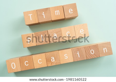 TPO; Wooden blocks with "Time Place Occasion"  text of concept. Royalty-Free Stock Photo #1981160522