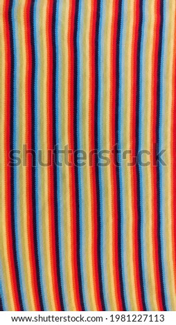 background of rainbow fabric. place for text. bright banner. copy space
