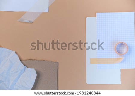 greeting card mockup. different paper textures with torn and smooth edges on a beige background. . place for text.
