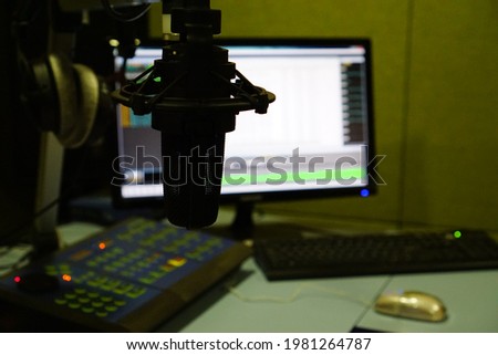 Close-up of the microphone in the broadcast room of the radio station.