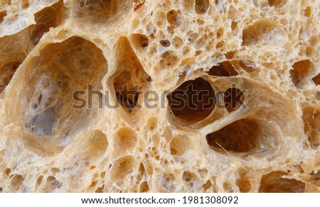 The surface of the sliced bread close-up. Art bread.