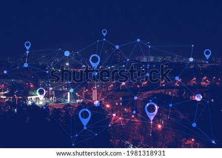 View of modern city with location pointers at night Royalty-Free Stock Photo #1981318931