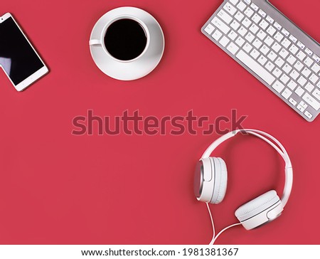 Flat layout on red background. Horizontal photo. Composition concept online conference, desktop, office work and training, concept blogging, online education. Best quality.