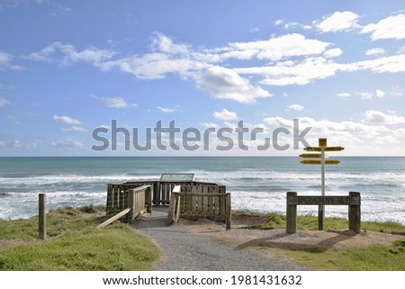 The seascapes and iconic sign post  at McCraken Rest in Southland, New Zealand.