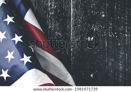 American Flag on wooden Table background