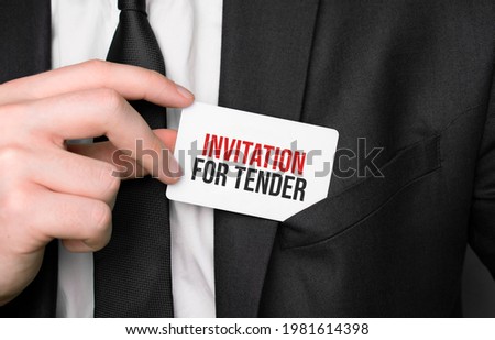 Businessman holding a card with text INVITATION FOR TENDER