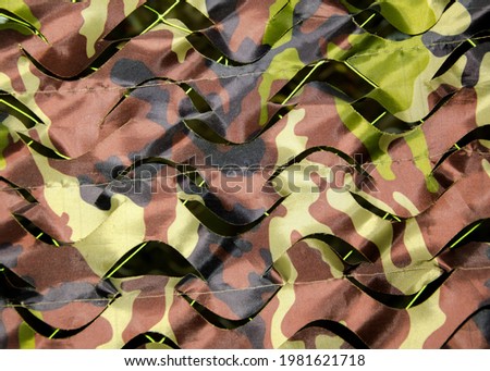 Camouflage military background. Photography. For design.
