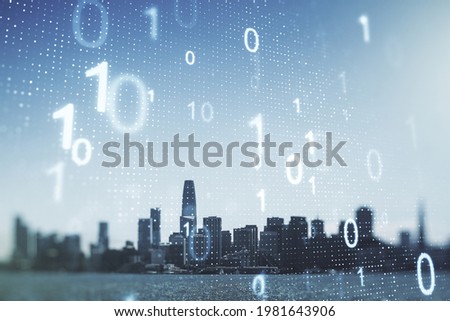 Double exposure of abstract virtual binary code hologram on San Francisco city skyscrapers background. Database and programming concept