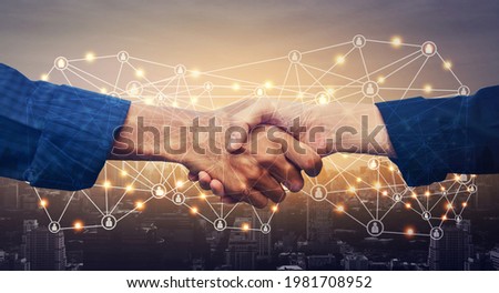 Close up hands shake business agreement success concept