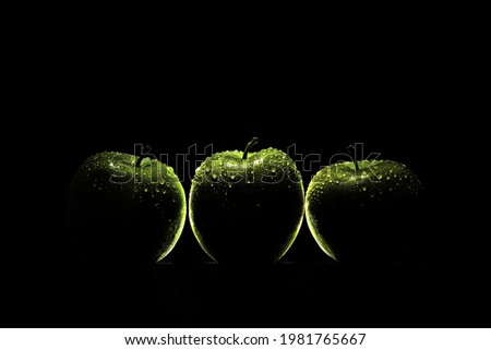 Green apple with dark photography style